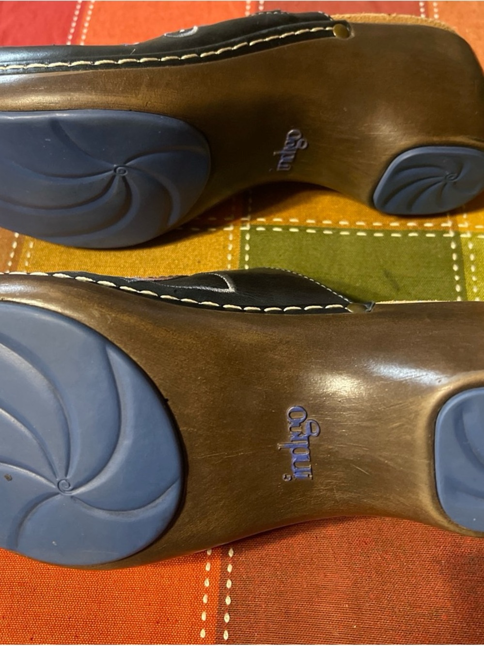Clarks women’s Black Leather clogs  with Blue Soles